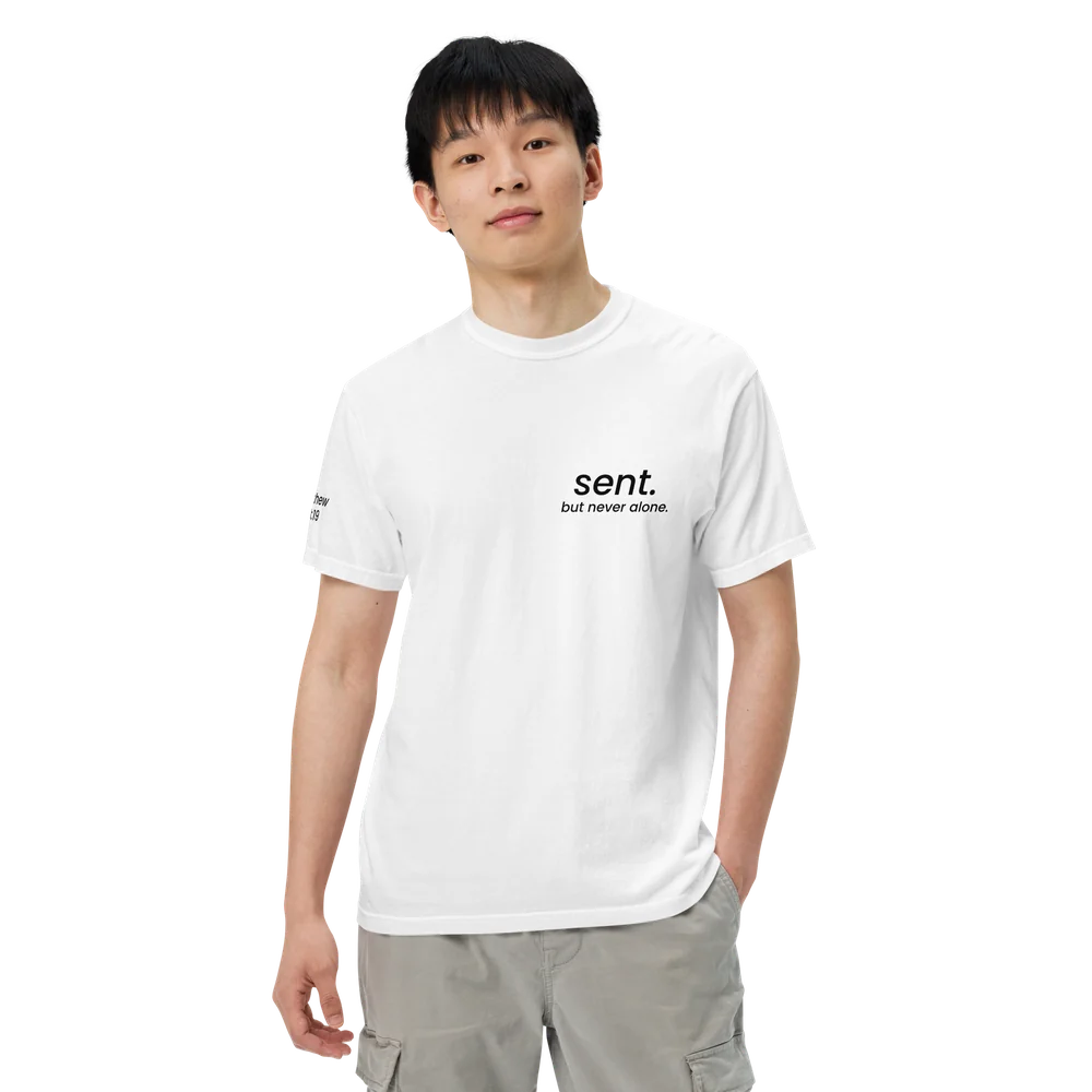 Model wearing the white Sent tee with black lettering