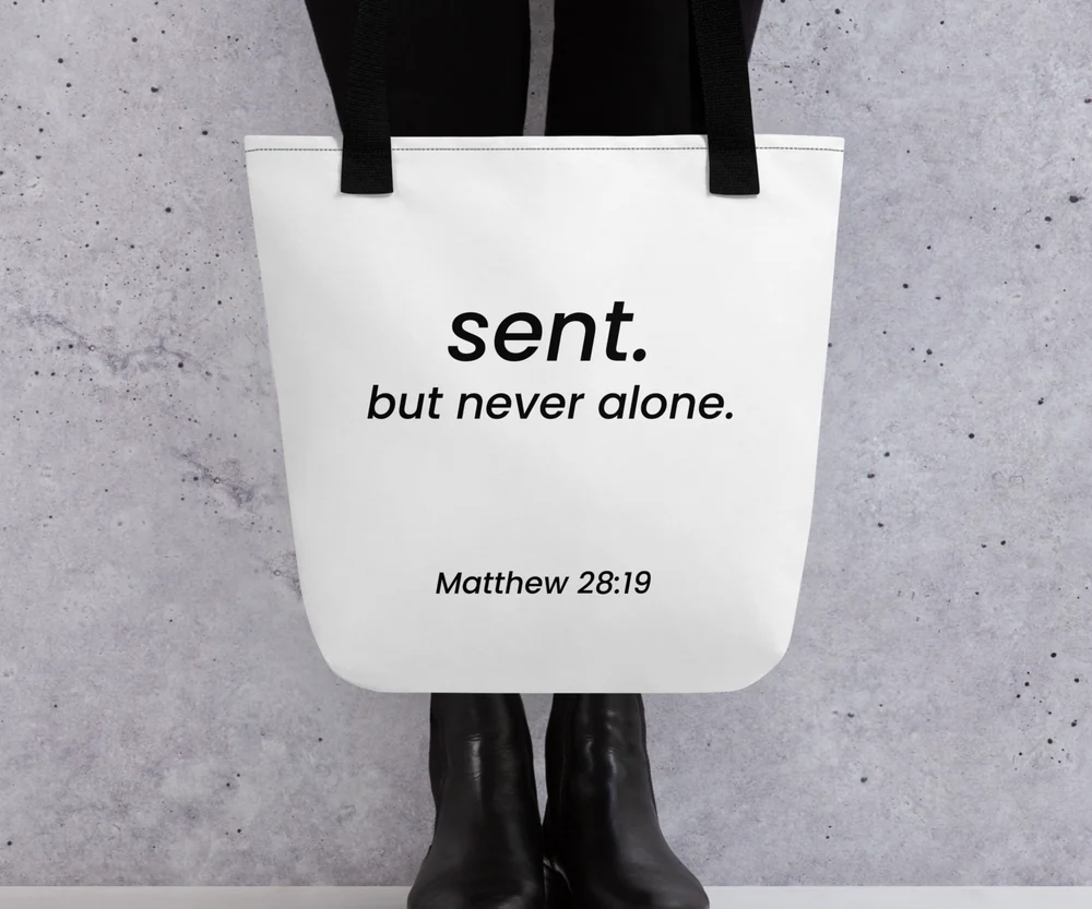 Model holding the Sent tote with the full printed design visible